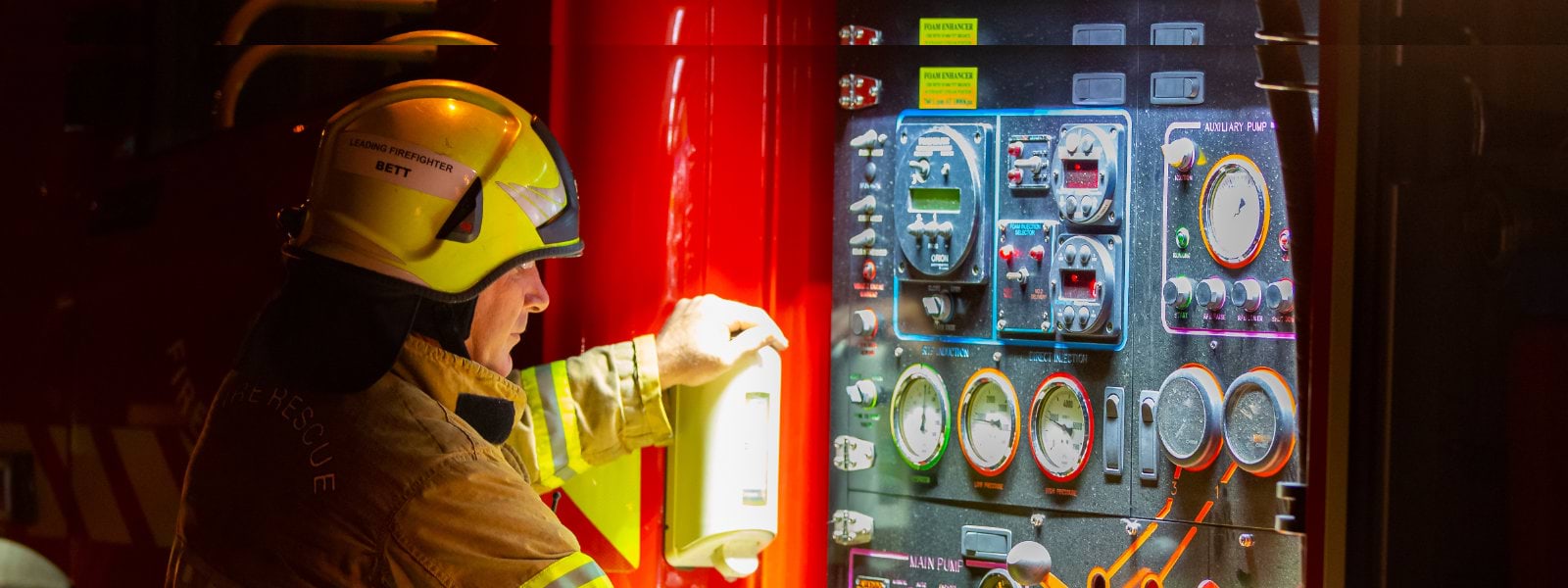 A firefighter checking truck 