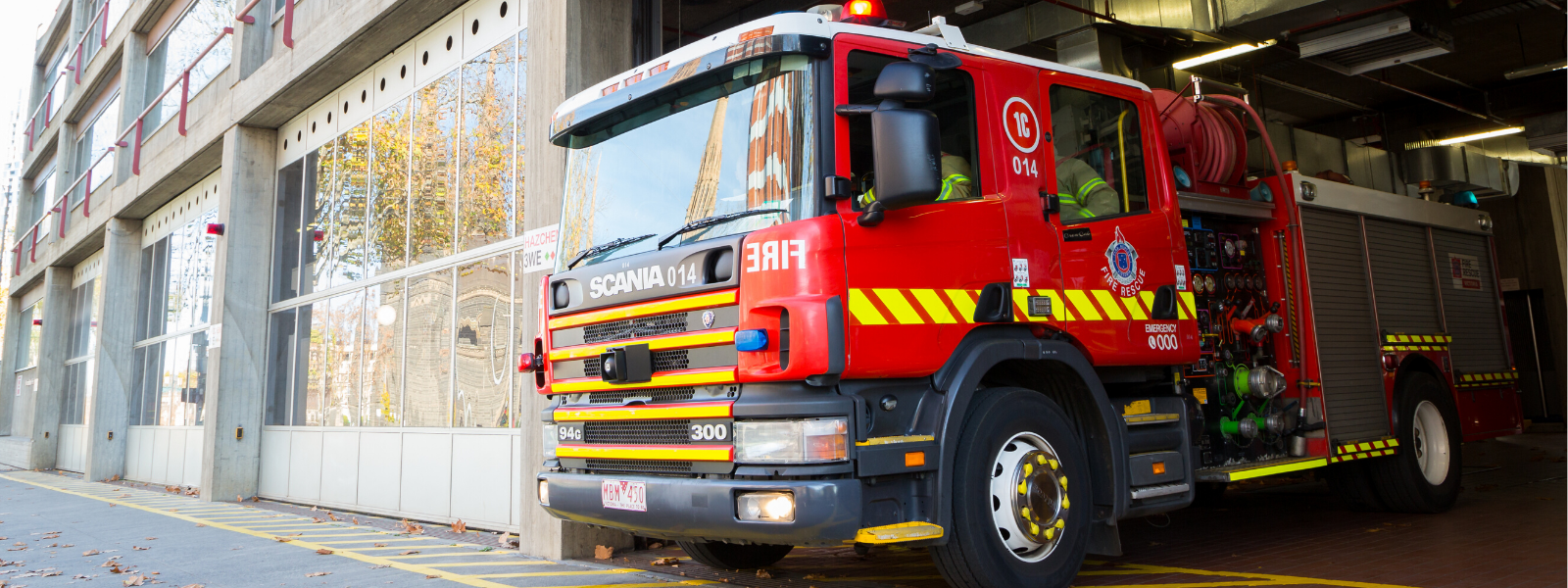 A fire truck leaving the station 