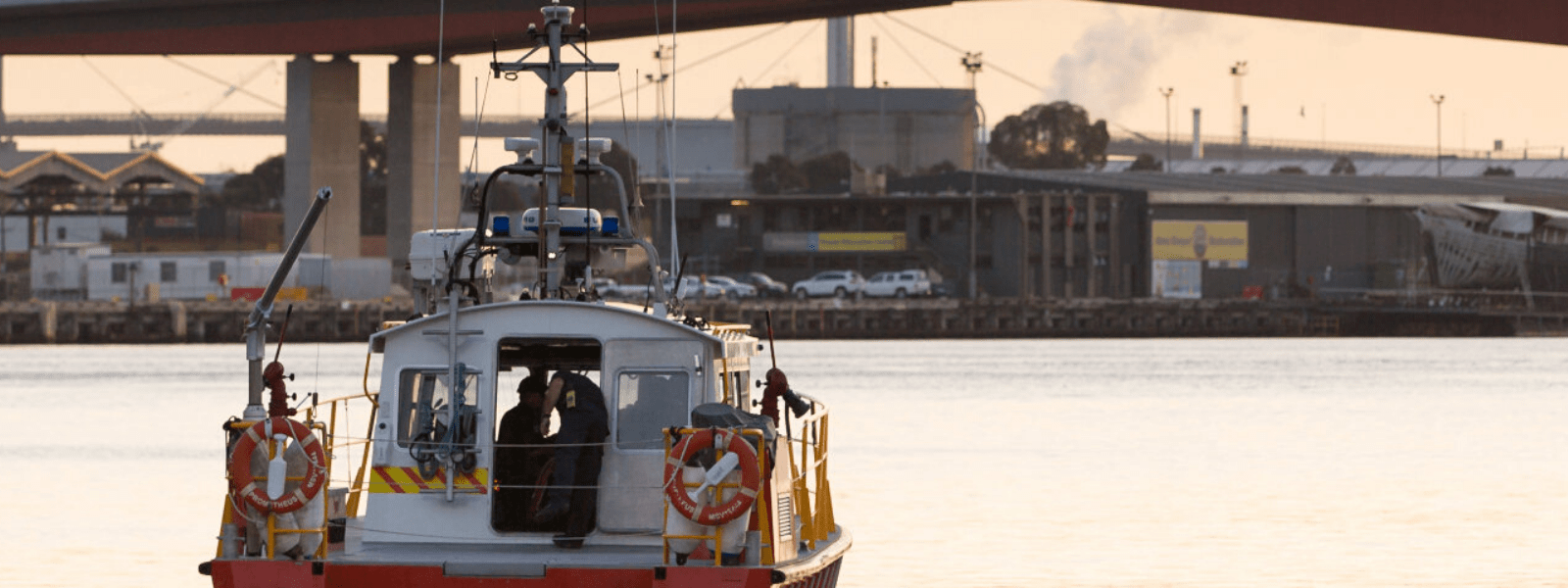 A fire boat on a bay 